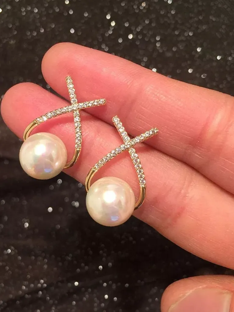 pearl earrings.webp